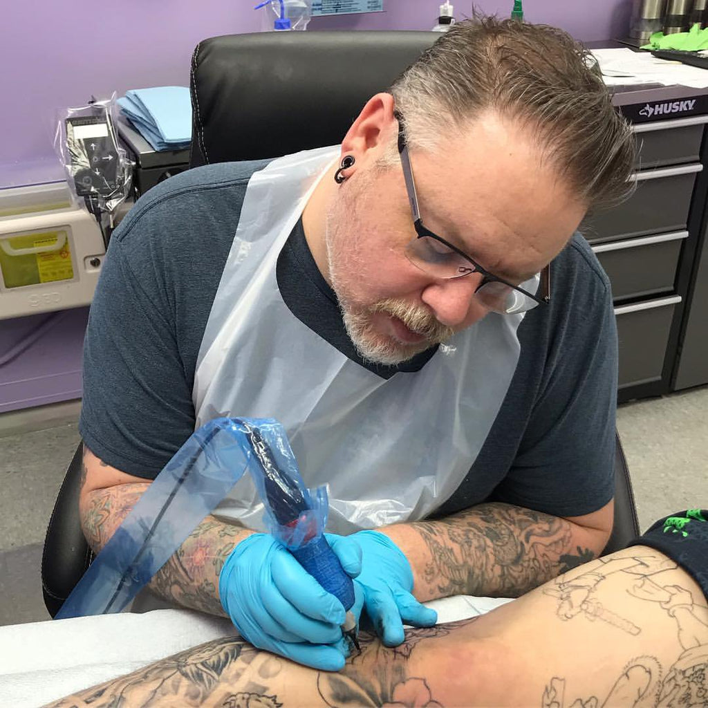 Peel Smith Talks ‘90s Tattooing, His Dad’s Legacy & Judging At Conventions